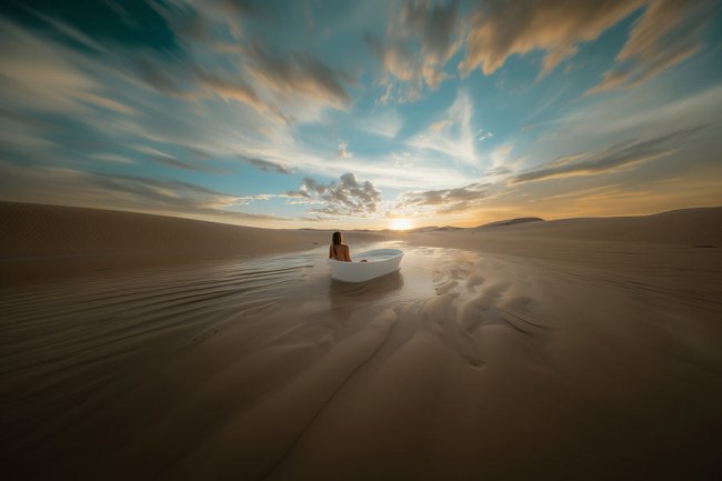 Baño con puesta de sol